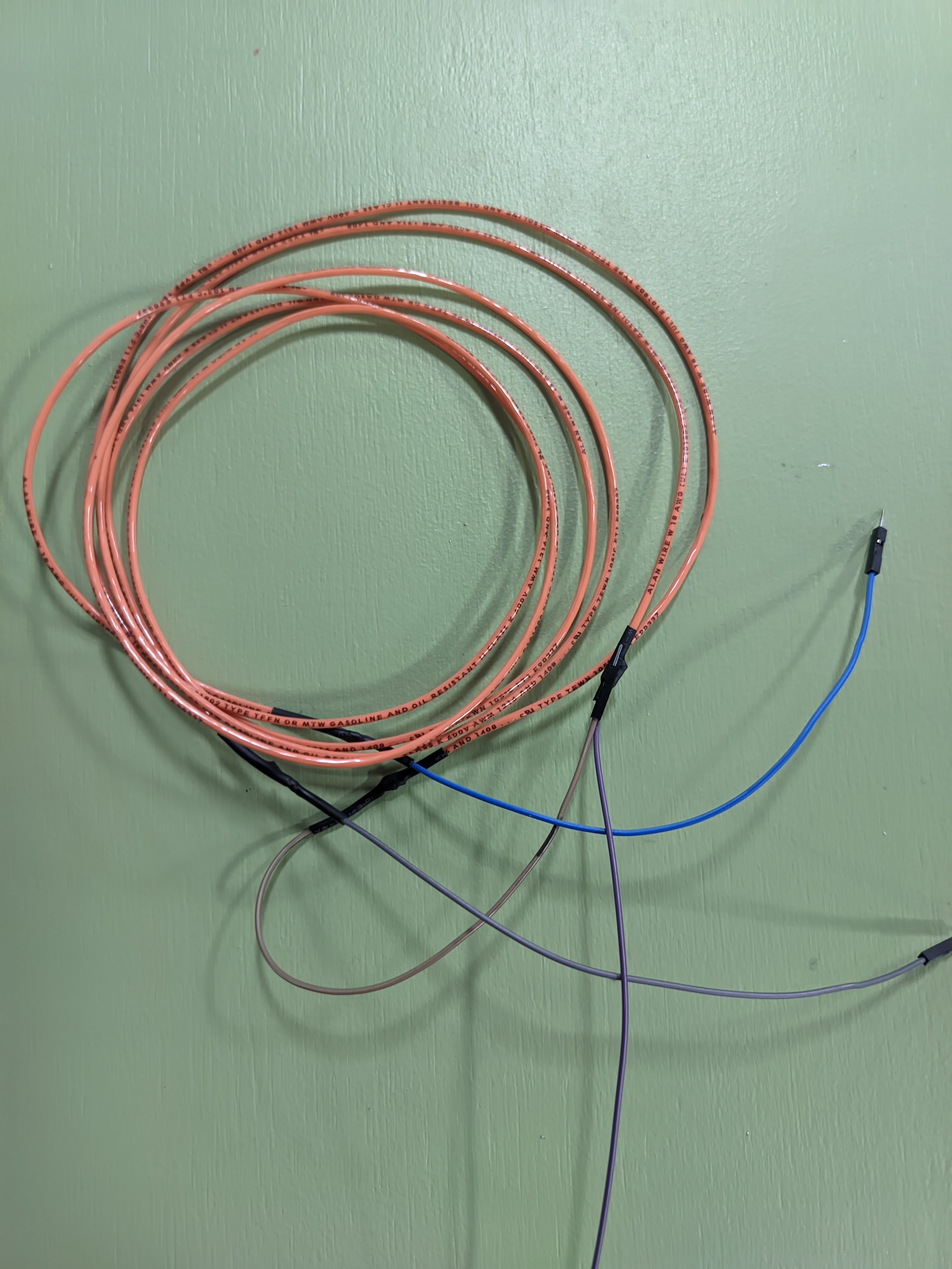 Spool of copper coil wire for the fence loop